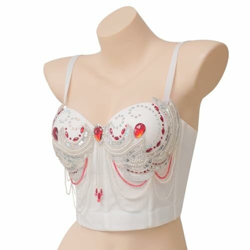 Corsé decorativo con perlas y gemas en un maniquí.